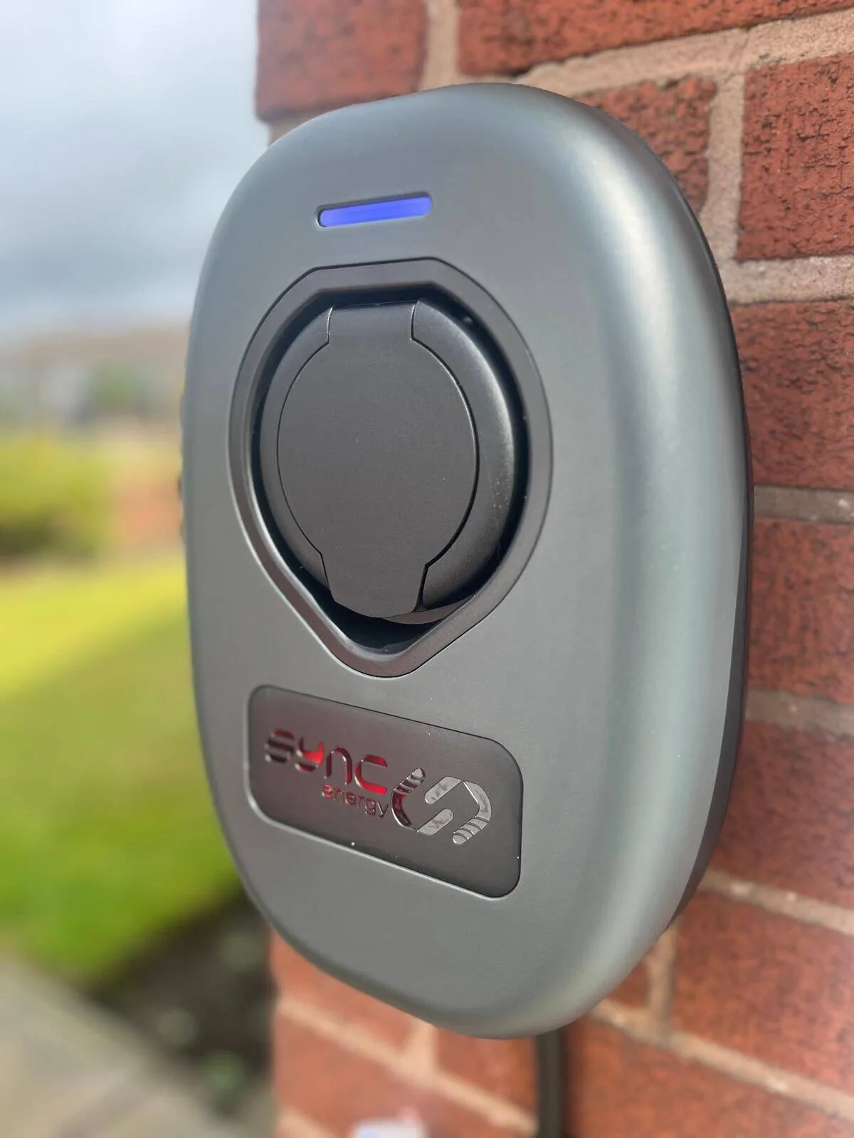 Sync EV 7.5kW charger wall unit installed at a customer's home